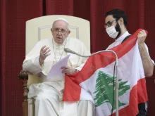 Pope Francis with the flag of Lebanon at a general audience at the Vatican, Sept. 2, 2020.